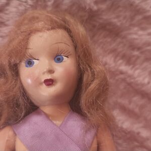 Antique Doll in Lavender Dress